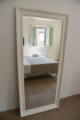 Letto o letti in una camera di Palazzetto Barnaba