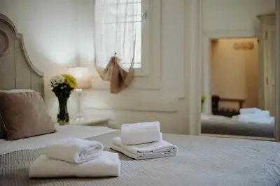 Letto o letti in una camera di Palazzetto Barnaba