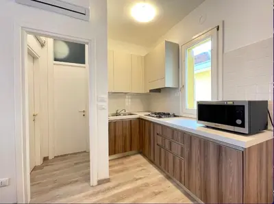 Cucina o angolo cottura di Olimpo - Carraro Immobiliare - Family Apartments
