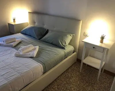 Letto o letti in una camera di SALAMON GUEST HOUSE
