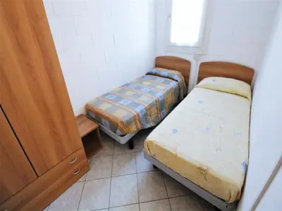 Letto o letti in una camera di Holiday Home in Rosolina Mare near Beach