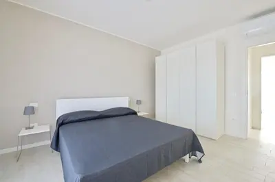 Letto o letti in una camera di Saint Tropez Apartments