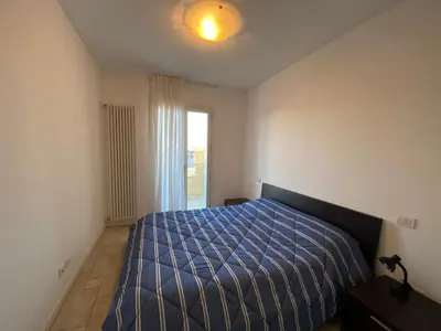 Letto o letti in una camera di Residenze Mediterranee - Immobiliare Living