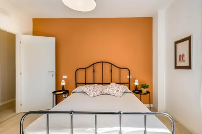 Letto o letti in una camera di GuestHost - Family & Friends Rooms with shared bathroom