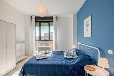 Letto o letti in una camera di GuestHost - Family & Friends Rooms with shared bathroom