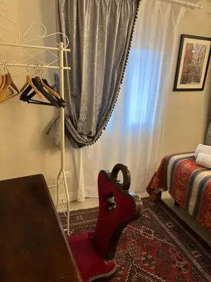 Letto o letti in una camera di Familly rooms (two rooms) Cà del Traghetto