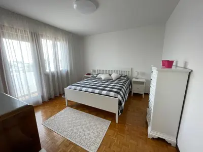 Letto o letti in una camera di Bellavista