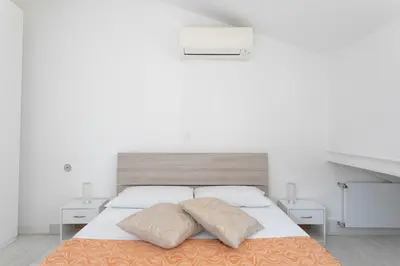 Letto o letti in una camera di Ca' Sciarrin Apartment near Rialto bridge