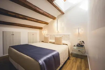 Letto o letti in una camera di Locanda Ca' Lucrezia