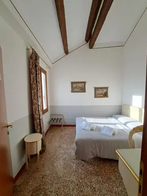 Letto o letti in una camera di Locanda Ca' Formosa
