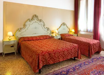 Letto o letti in una camera di Guesthouse Ca' San Marcuola 1