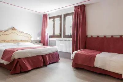 Letto o letti in una camera di Ca' San Trovaso - 6 Rooms