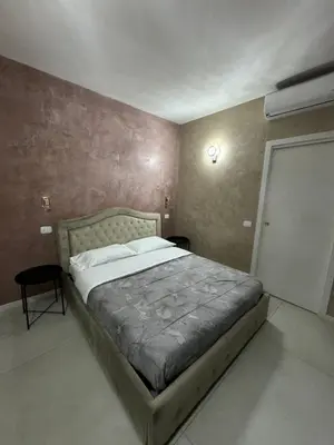 Letto o letti in una camera di Residence Giove