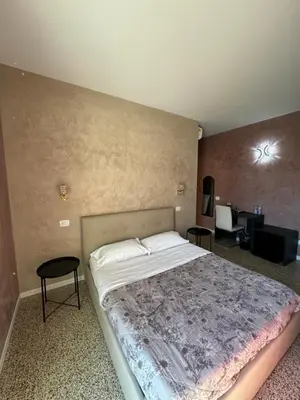 Letto o letti in una camera di Residence Giove