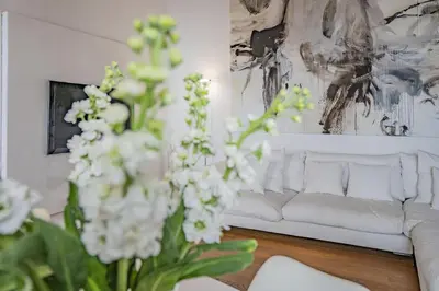 Area soggiorno di Colleoni Apartment with 2 Superb Terraces
