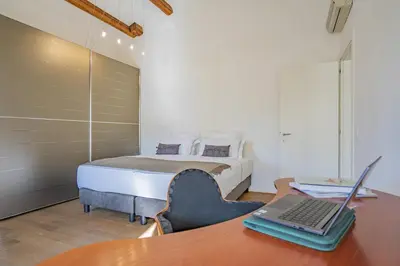 Letto o letti in una camera di Colleoni Apartment with 2 Superb Terraces