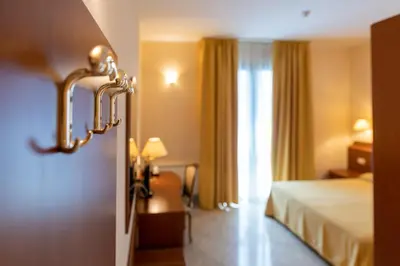 Letto o letti in una camera di Hotel Ambasciata Venice - Atika & Atif