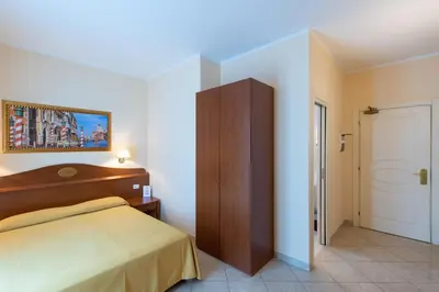 Letto o letti in una camera di Hotel Ambasciata Venice - Atika & Atif