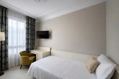 Letto o letti in una camera di Hotel President Venezia