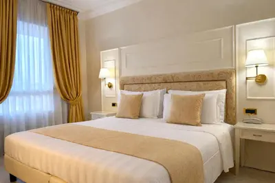 Letto o letti in una camera di Hotel President Venezia