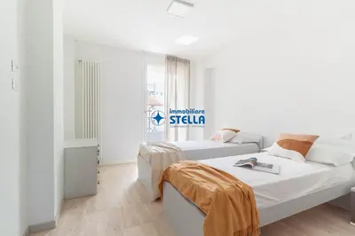 Letto o letti in una camera di Condominio Trento