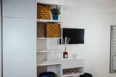 TV o dispositivi per l'intrattenimento presso BELLINI LIVING APARTMENTS