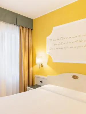 Letto o letti in una camera di Hotel Ca' Tron