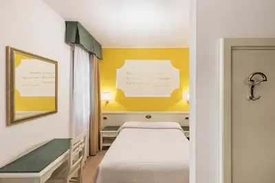 Letto o letti in una camera di Hotel Ca' Tron