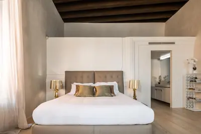 Letto o letti in una camera di Palazzo Soranzo Noble Floor R&R