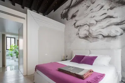 Letto o letti in una camera di Palazzo Soranzo Noble Floor R&R