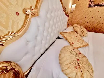 Letto o letti in una camera di Hotel Gardena
