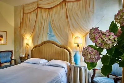 Letto o letti in una camera di Hotel Gardena