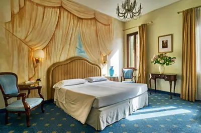 Letto o letti in una camera di Hotel Gardena