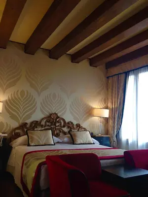 Letto o letti in una camera di Hotel Amadeus