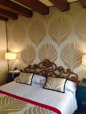 Letto o letti in una camera di Hotel Amadeus