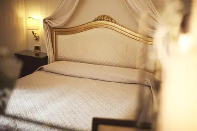 Letto o letti in una camera di Hotel Ca' D'Oro - WENICE Deep Culture