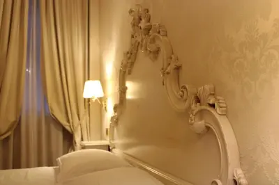 Letto o letti in una camera di Hotel al Graspo de Ua