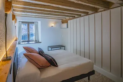 Letto o letti in una camera di Corte Rubbi 5514 Canal View