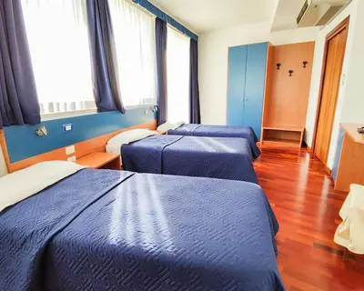 Letto o letti in una camera di Hotel all'Oasi