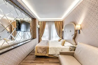 Letto o letti in una camera di Hotel Belle Arti