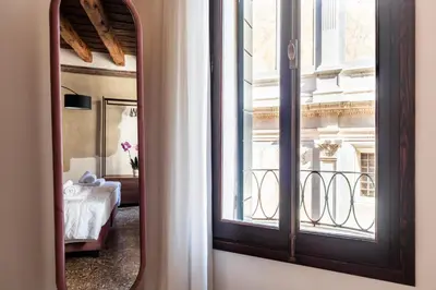 Letto o letti in una camera di Palazzo Miracoli Apartments