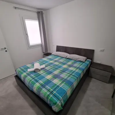 Letto o letti in una camera di CHIOGGIA VENICE APARTMENT