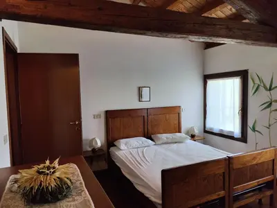 Letto o letti in una camera di Ca degli Aironi