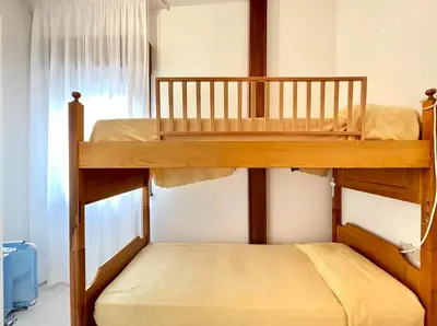 Letto o letti in una camera di Emily - Carraro Immobiliare - Family Apartments