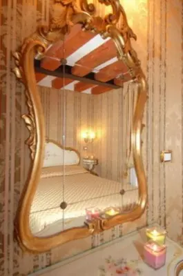 Letto o letti in una camera di Residenza Hotel San Maurizio