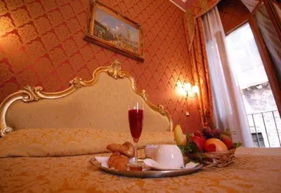 Letto o letti in una camera di Residenza Hotel San Maurizio