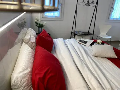 Letto o letti in una camera di Appartamento vintage