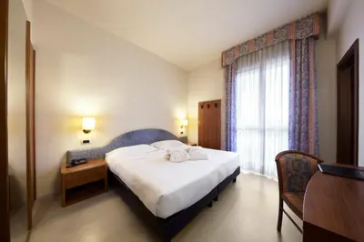 Letto o letti in una camera di Hotel Aqua