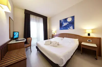 Letto o letti in una camera di Hotel Aqua