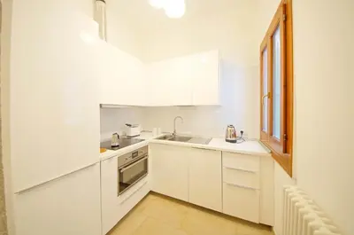 Cucina o angolo cottura di DolceVita Apartments N 499 Biennale